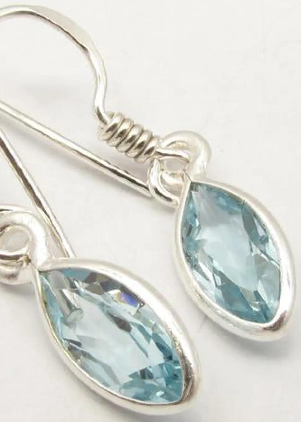 solid_silver_blue_topaz_m_1.webp Solid Silver Blue Topaz Marquise Drop Earrings