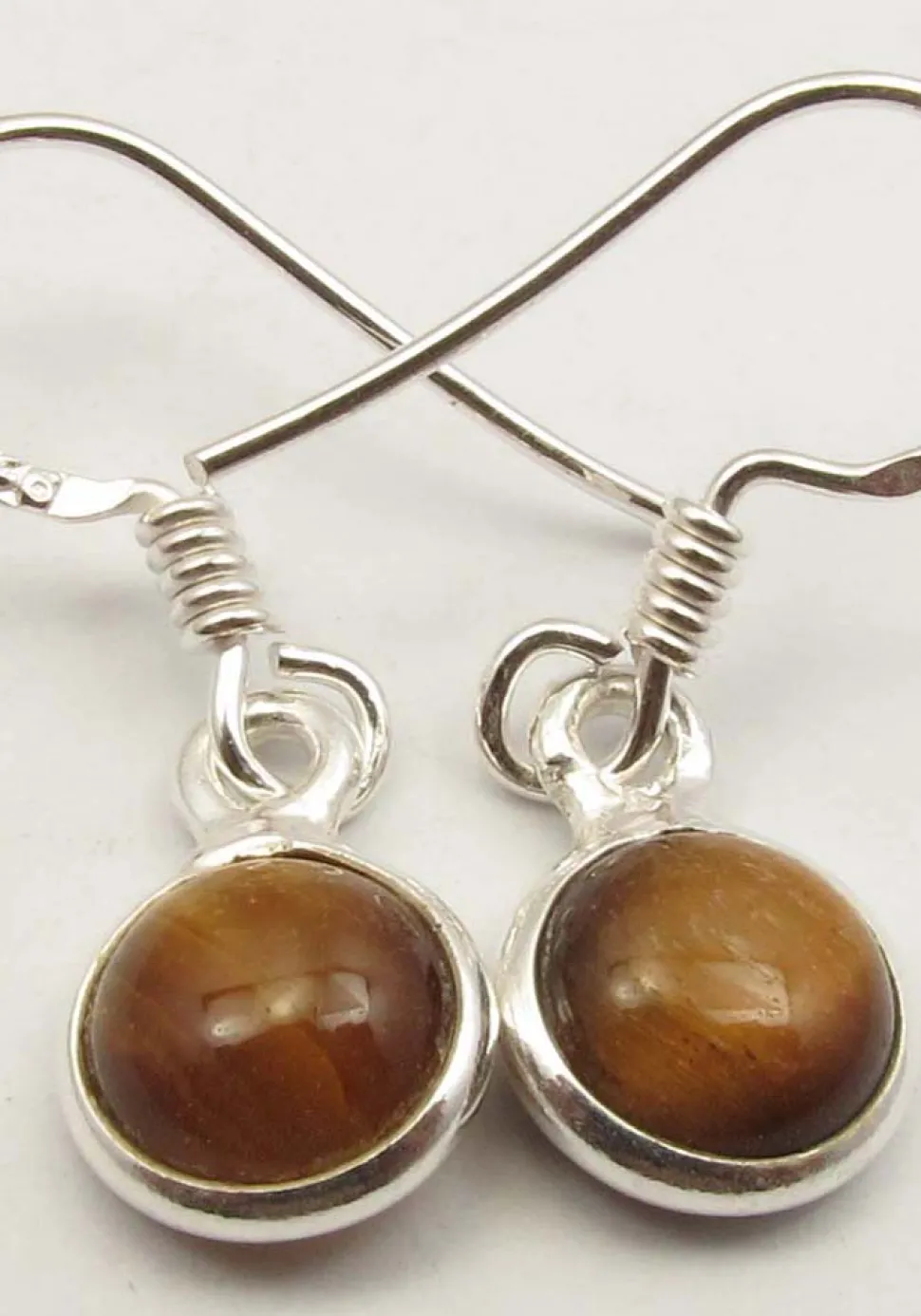 solid_silver_round_caboch_0.webp Solid Silver Round Cabochon Drop Tigers Eye Earrings