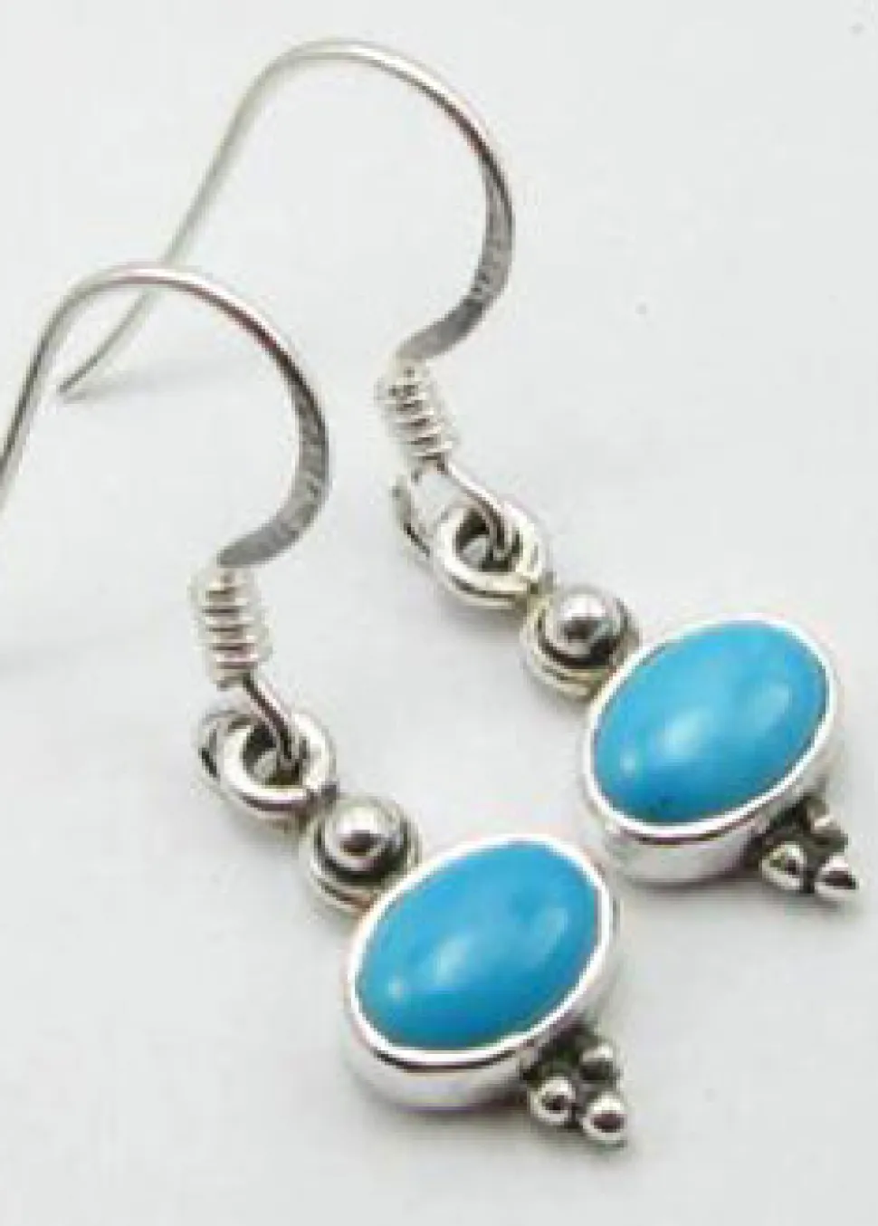 solid_silver_turquoise_ov_0.webp Solid Silver Turquoise Oval Drop Earrings