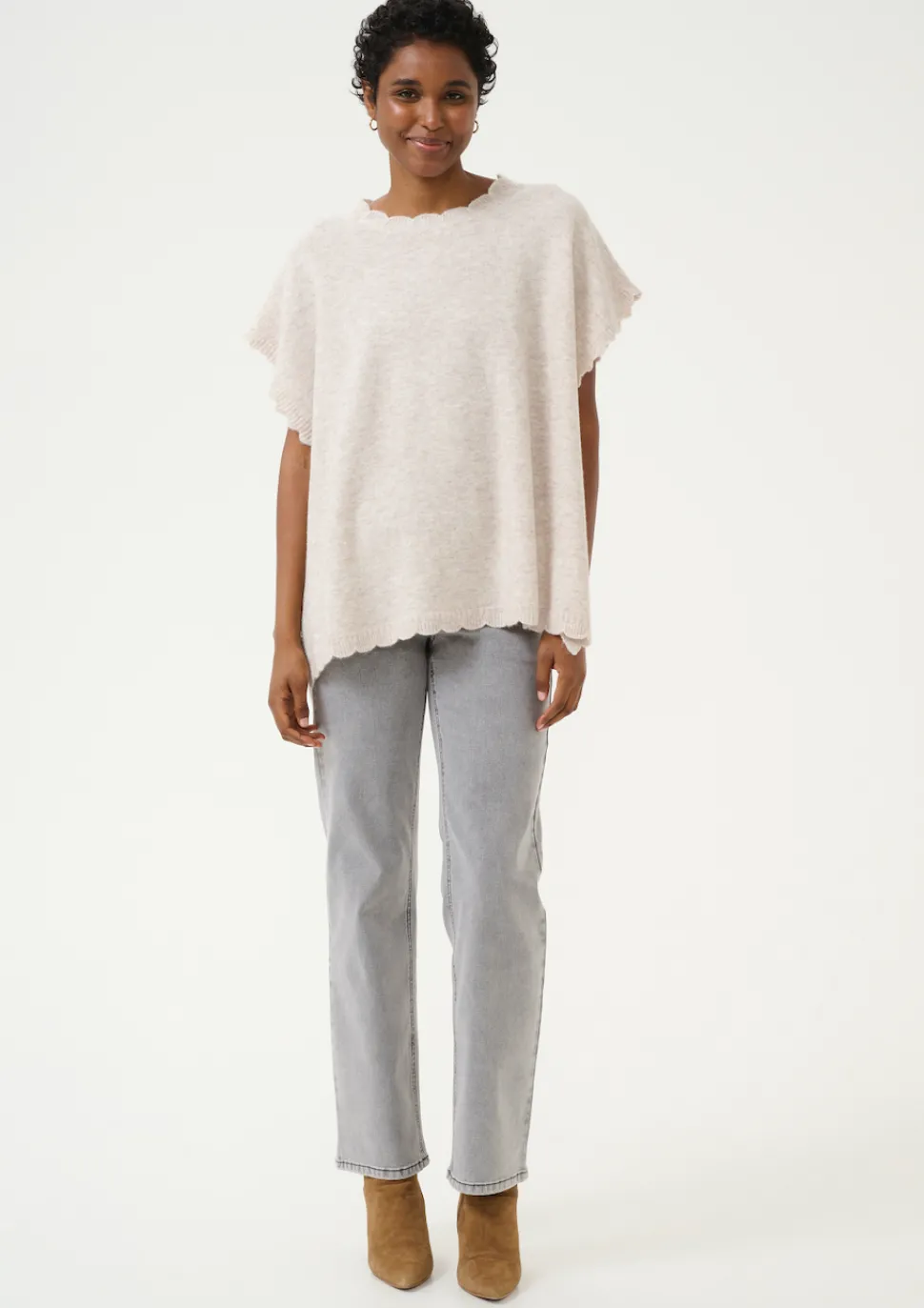dammi_knit_poncho_in_stri_2.webp Dammi Knit Poncho in String Melange