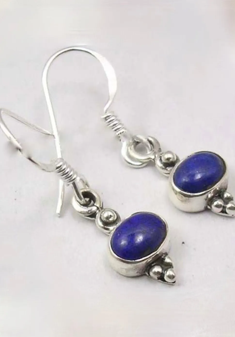 solid_silver_lapis_lazuli_1.webp Solid Silver Lapis Lazuli Oval Cabachon Drop Earrings