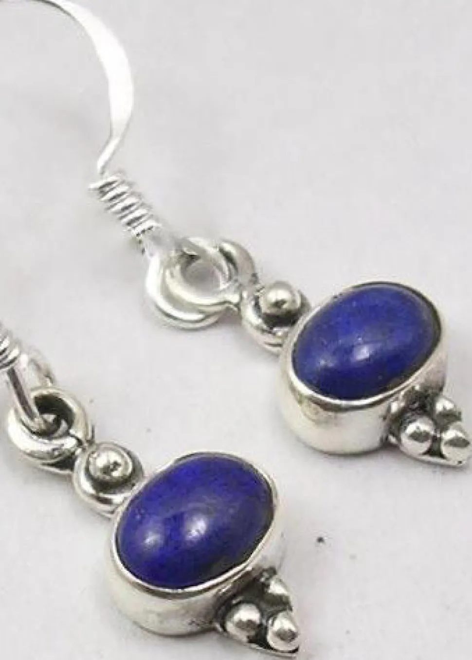 solid_silver_lapis_lazuli_2.webp Solid Silver Lapis Lazuli Oval Cabachon Drop Earrings